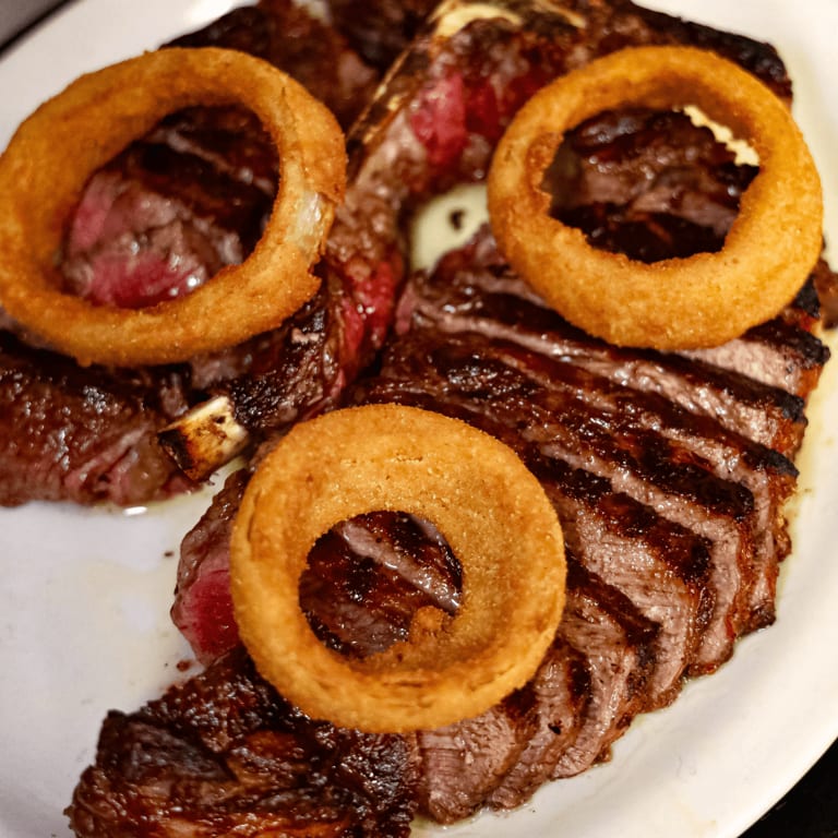 Indulge in Our Porterhouse